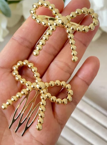 BROCHE DE LAZO DORADO